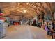 Spacious unfinished attic with exposed wood beams and ample storage space at 4105 Brookview Dr, Cumming, GA 30040