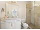 Bathroom showcases a glass shower and single vanity with a light countertop and fixtures at 4105 Brookview Dr, Cumming, GA 30040