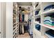 Spacious closet featuring ample shelving and hanging space for clothes and shoes at 4105 Brookview Dr, Cumming, GA 30040
