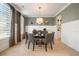 Elegant dining room with table, chairs, and refined decor at 4105 Brookview Dr, Cumming, GA 30040