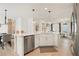 Kitchen includes a large island, stainless steel appliances, and an adjacent dining area at 4105 Brookview Dr, Cumming, GA 30040