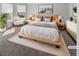 Modern bedroom featuring a platform bed, stylish furniture, and bright natural light at 2470 Bridle Bridge Trl, Cumming, GA 30040