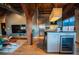 Kitchen and living room combo with island, stainless steel appliances, wooden floors, and modern furniture at 490 Marietta Nw St # 101, Atlanta, GA 30313
