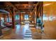 Spacious living room with exposed brick, wooden beams, and an open floor plan at 490 Marietta Nw St # 101, Atlanta, GA 30313