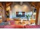 Cozy living room featuring exposed wooden beams, modern furniture, and an entertainment center at 490 Marietta Nw St # 101, Atlanta, GA 30313