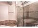 Modern shower with glass enclosure, sleek fixtures, and stylish tile accents at 490 Marietta Nw St # 101, Atlanta, GA 30313