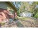 Spacious backyard with a detached garage, providing ample storage space at 1189 E East Fayetteville Rd, Riverdale, GA 30296