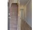 Light and airy entryway with a carpeted staircase and wood-look flooring at 3135 Washburn St, Atlanta, GA 30354