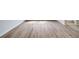 Close up of wood-look flooring and white baseboards with a smooth finish at 3135 Washburn St, Atlanta, GA 30354