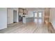 Modern kitchen with stainless steel appliances, grey cabinets and island with sink at 3135 Washburn St, Atlanta, GA 30354