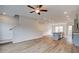 Open floor plan features wood look vinyl floors, stairs to upper level, and a modern kitchen at 3135 Washburn St, Atlanta, GA 30354
