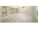 Spacious basement area with laminate flooring, white walls, and recessed lighting at 4562 Anderson Livsey Ln, Snellville, GA 30039