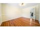 Elegant dining room with hardwood floors, wainscoting, and stylish lighting at 4562 Anderson Livsey Ln, Snellville, GA 30039