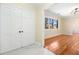 Bright foyer leads to a spacious room with beautiful hardwood floors at 4562 Anderson Livsey Ln, Snellville, GA 30039