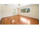 Spacious living room with large window showcasing the wooded outdoors at 4562 Anderson Livsey Ln, Snellville, GA 30039