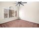 Cozy bedroom with carpet and a large window that provides natural light and scenic views at 5071 Vinings Estates Se Ct, Mableton, GA 30126