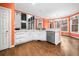 Bright kitchen with white cabinets, marble countertops, and stainless steel appliances at 5071 Vinings Estates Se Ct, Mableton, GA 30126