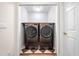 A conveniently located laundry closet equipped with a modern washer and dryer set at 5071 Vinings Estates Se Ct, Mableton, GA 30126