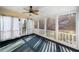 Relaxing screened porch with wooded views and plenty of natural light at 5071 Vinings Estates Se Ct, Mableton, GA 30126