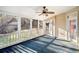 Inviting screened porch perfect for enjoying the outdoor scenery at 5071 Vinings Estates Se Ct, Mableton, GA 30126