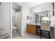 Bathroom vanity area features a granite countertop, a sink, and tile flooring at 106 Brighton Pt, Atlanta, GA 30328