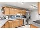 Modern kitchen with granite counters, stainless steel appliances, and ample cabinet space at 106 Brighton Pt, Atlanta, GA 30328