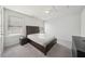 A bedroom with neutral walls, carpet, and a bed frame with windows that allow natural light at 158 Rolling Hills Pl, Canton, GA 30114