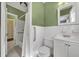 Bathroom with a white tiled bath and shower combination at 2345 Henderson Mill Ne Rd # 1, Atlanta, GA 30345