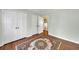 Bedroom featuring wood floors, closet, and neutral paint at 2345 Henderson Mill Ne Rd # 1, Atlanta, GA 30345