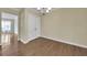 Hardwood dining room features bright walls, neutral colors, and double-door closet at 2345 Henderson Mill Ne Rd # 1, Atlanta, GA 30345