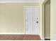 Entryway of home featuring wood floors and a white door at 2345 Henderson Mill Ne Rd # 1, Atlanta, GA 30345