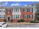Charming brick townhouse with black shutters and bay windows at 2345 Henderson Mill Ne Rd # 1, Atlanta, GA 30345