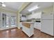 Spacious kitchen with a central island, modern appliances, and French doors at 2345 Henderson Mill Ne Rd # 1, Atlanta, GA 30345