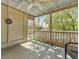 View of screened in porch with concrete floor and view to outside at 2345 Henderson Mill Ne Rd # 1, Atlanta, GA 30345