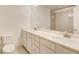 Bathroom with a white marble vanity, stainless steel fixtures, and a ceramic tile floor at 3483 Summerlin Pkwy, Lithia Springs, GA 30122