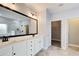 Bathroom with double vanity, walk-in closet, and lots of storage space at 3483 Summerlin Pkwy, Lithia Springs, GA 30122