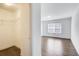 Bright bedroom with hardwood floors, closet, and window providing natural light at 3483 Summerlin Pkwy, Lithia Springs, GA 30122