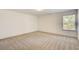 Neutral bedroom featuring neutral walls, carpet, and white trim at 3483 Summerlin Pkwy, Lithia Springs, GA 30122
