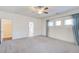 Spacious bedroom with new carpet, ceiling fan, walk in closet, and an ensuite bathroom at 3483 Summerlin Pkwy, Lithia Springs, GA 30122