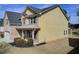 Two-story home with brick and vinyl siding, lush landscaping, and attached garage at 3483 Summerlin Pkwy, Lithia Springs, GA 30122