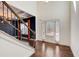 Bright, two-story foyer with hardwood floors, staircase, and views to formal dining at 3483 Summerlin Pkwy, Lithia Springs, GA 30122