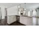 Bright kitchen boasts granite countertops, stainless appliances, and pendant lighting at 3483 Summerlin Pkwy, Lithia Springs, GA 30122