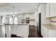 Bright kitchen with a center island, pendant lighting, stainless appliances and hardwood floors at 3483 Summerlin Pkwy, Lithia Springs, GA 30122