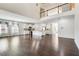 Large living space combining the kitchen, living and dining areas under high ceilings at 3483 Summerlin Pkwy, Lithia Springs, GA 30122