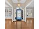 Welcoming foyer with hardwood floors and decorative chandelier at 2021 Cockrell Pointe Nw, Kennesaw, GA 30152