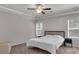 Bedroom featuring neutral tones, carpet, and plenty of natural light at 2099 Easterwood Ter, Decatur, GA 30032