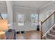 Welcoming foyer with hardwood floors, staircase, and natural light at 2099 Easterwood Ter, Decatur, GA 30032