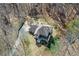 Aerial view of a home surrounded by mature trees at 120 Mill Creek Ct, Acworth, GA 30101