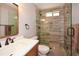 Modern bathroom featuring a glass door shower and updated fixtures at 120 Mill Creek Ct, Acworth, GA 30101