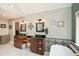 Elegant bathroom features double vanities, a soaking tub with decorative tile surround, and marble floors at 120 Mill Creek Ct, Acworth, GA 30101